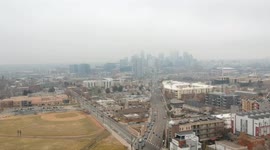 A beautiful sky view of a foggy day in Denver with students on recess
