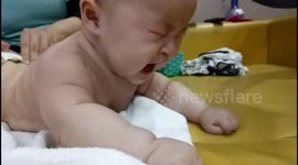Funny video of baby hates being massaged at baby spa