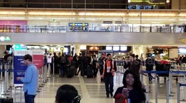 LAX airport police arresting an employee allegedly stealing headphones in tsa