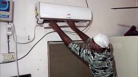 Tiny snake rescued from air conditioning unit in India