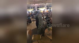US Airman surprises fiancé with return from military training