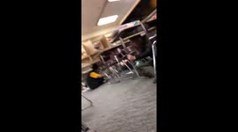 Footage shows the moment students duck under tables as 7.0-magnitude strikes Anchorage, Alaska