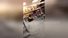 Footage shows the moment students duck under tables as 7.0-magnitude strikes Anchorage, Alaska