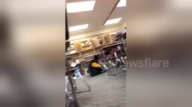 Footage shows the moment students duck under tables as 7.0-magnitude strikes Anchorage, Alaska