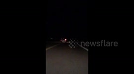 Drunk driver rushed out of burning car by sympathetic passersby