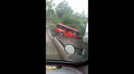 At least 25 injured as bus skids off bridge in the Philippines