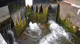 Lock gates opening on taunton canal . Somerset uk