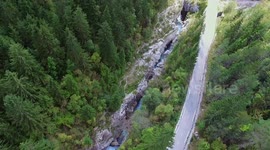 Aerial footage: nature, river, forest, sea, cliffs, mountains, bridge, village