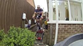 Man falls off cycling roller trainer
