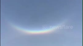 Amazing upside-down rainbow and sun dog spotted in north China