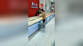 Woman is chased by jewellery shop clerk after being mistaken for robber