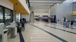 LAX airport police arresting man Who allegedly hit his girlfriend domestic violence at lax