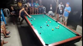 Players use their feet as a bridge in game of pool