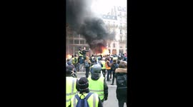 'Yellow vest' protesters set cars on fire in Paris