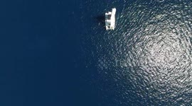 Blue clean ocean and sailing boat