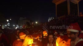 Santas Gather In Trafalgar Square In London For The Annual Santacon