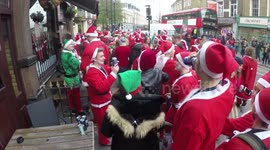 Santas Taking Part In The Annual Santacon Fill Up A Road In Kings Cross