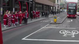 Battle Between Two Groups Of Santas Across a Road In Kings Cross