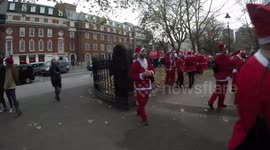 Santas Gather In Euston Square As Part Of The 2018 Santacon