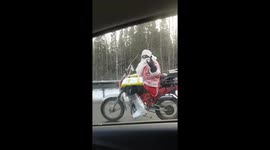 Russian Santa spotted riding the roads on his motorcycle