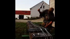Maine farmer makes enormous bass out of wooden beam