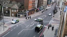 Police officers and Bomb Disposal deal with suspicious package in Southwark Street, London.