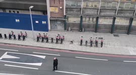 Sniffer dog inspects scene of 'suspicious package' in central London