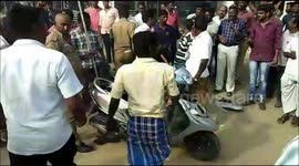 Fireman retrieves tiny snake from inside a man's scooter