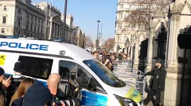 A police van arrives at Parliament after a man is detained and arrested by police