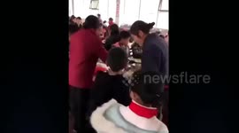 Two women sneak into school canteen to grab pupils’ food
