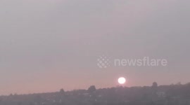 Sun Sets over the hill