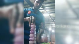 Clever chef slices 'tower of onions' using deft knifework