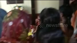 Wild monkey gatecrashes funeral, mimics mourners consoling family