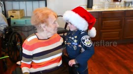Kansas' Officer Oliver melts hearts and brings festive cheer to nursing home residents