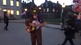 Raindeer singing Gingle Bells opposite Parliament ahead of Theresa May no confidence vote