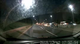Idiot driver crashes into a truck