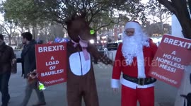 Santa Claus and Raindeer celebrate anti-Brexit Christmas - College Green ahead of no-confidence vote