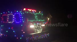 Santa in Arkansas shows up on his firetruck sleigh with his firefighter elves