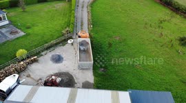 Drone footage shows lorry backing down country road in Ireland