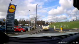 Caught on dash cam young girls trips and falls crossing road