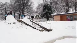 failed home made street rail snowboard slam to the chest.