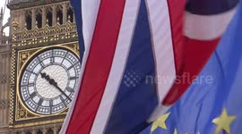 EU and UK flags are flying in front of Big Ben