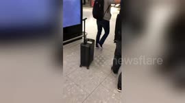 Woman is chased by her own automated suitcase through Heathrow airport