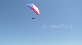 Paragliding landing- colours as Czech flag