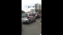 Road rage caught on camera after motorcyclist 'scratches car bumper'