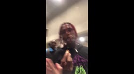 Famous dex feeds a fan a chicken nugget at rolling loud