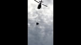 Hydro seeding with a helicopter