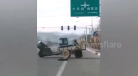 Out-of-control tractor does doughnuts on road while hapless driver chases