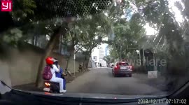 Moto Rider Skids and Falls