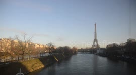 Urban landscape in-train view of the Eiffel Tower, Trocadero and the Seine River from the train RER C in direction of Paris, France. 17 December 2018.
